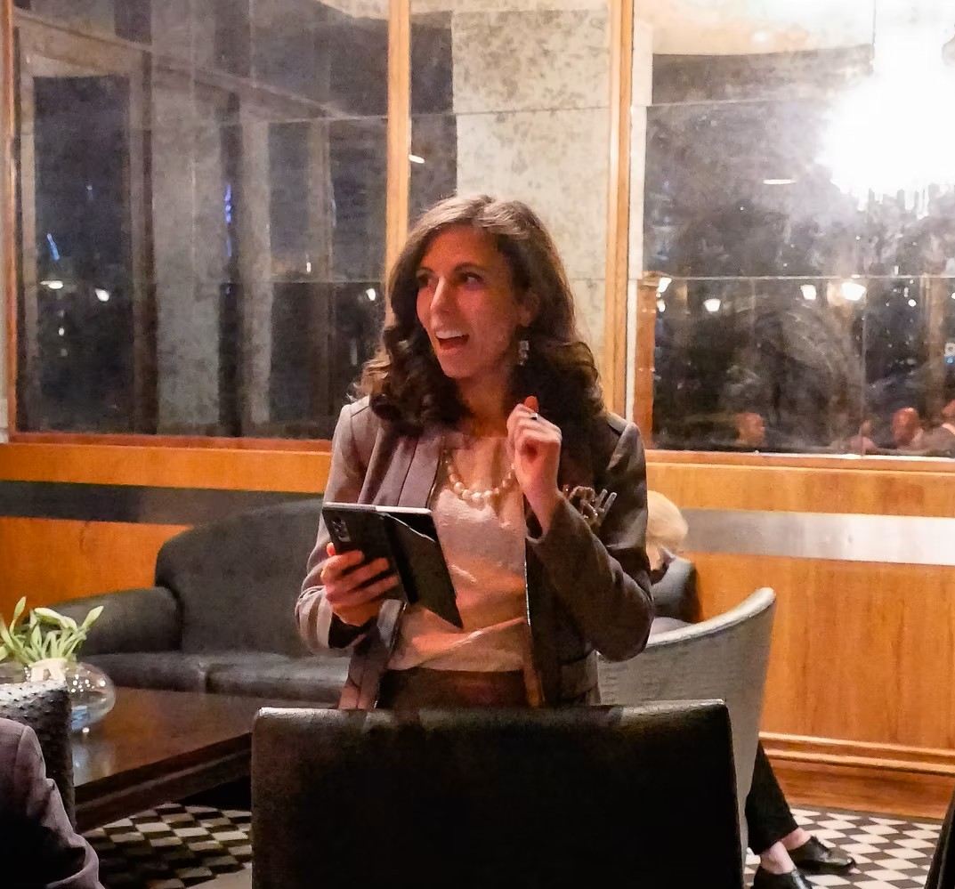 Dr. Lydia Kostopoulos leading a discussion